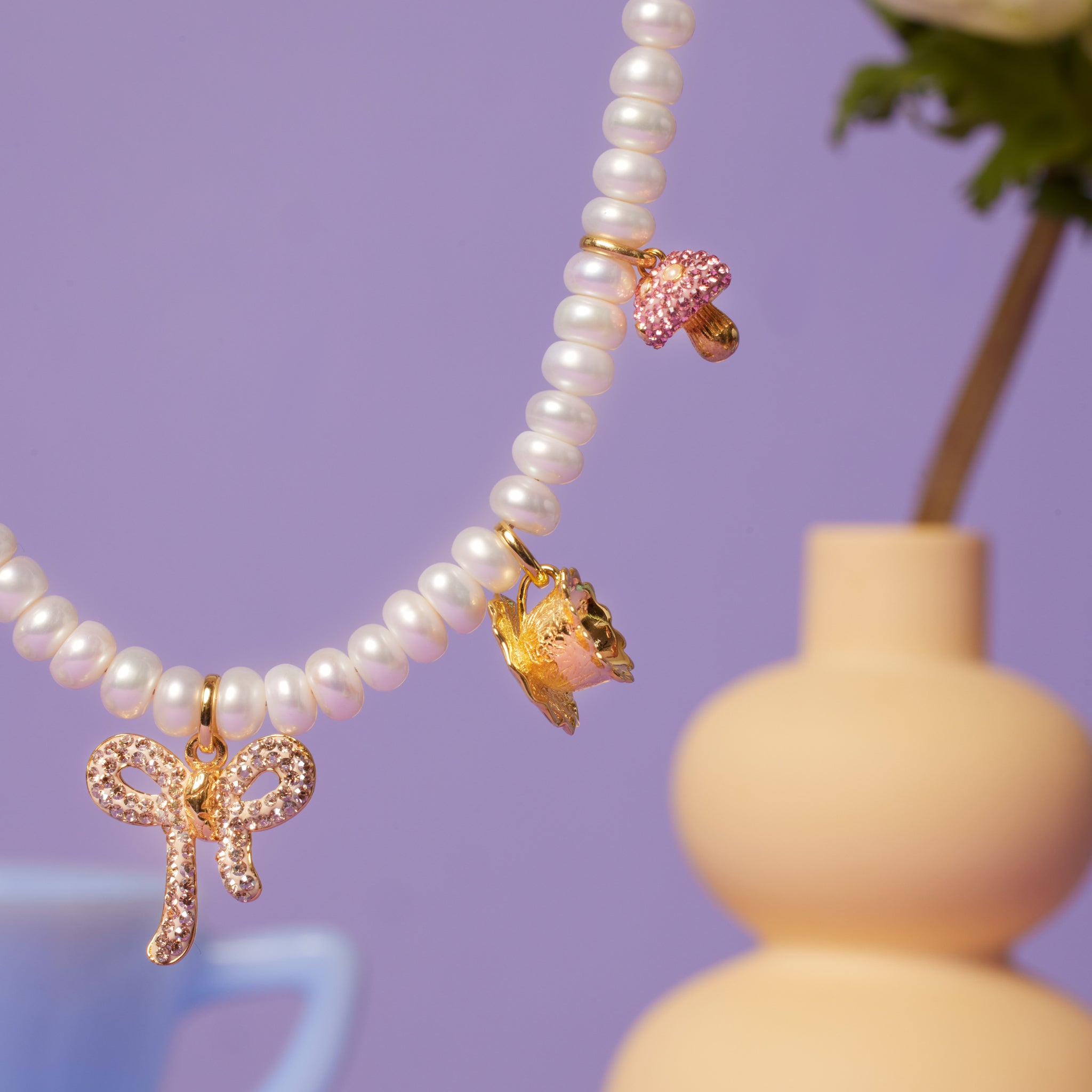 Alice-Inspired Charm Necklace close up