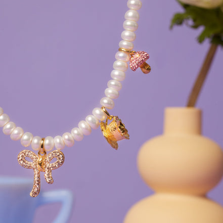 Alice-Inspired Charm Necklace close up