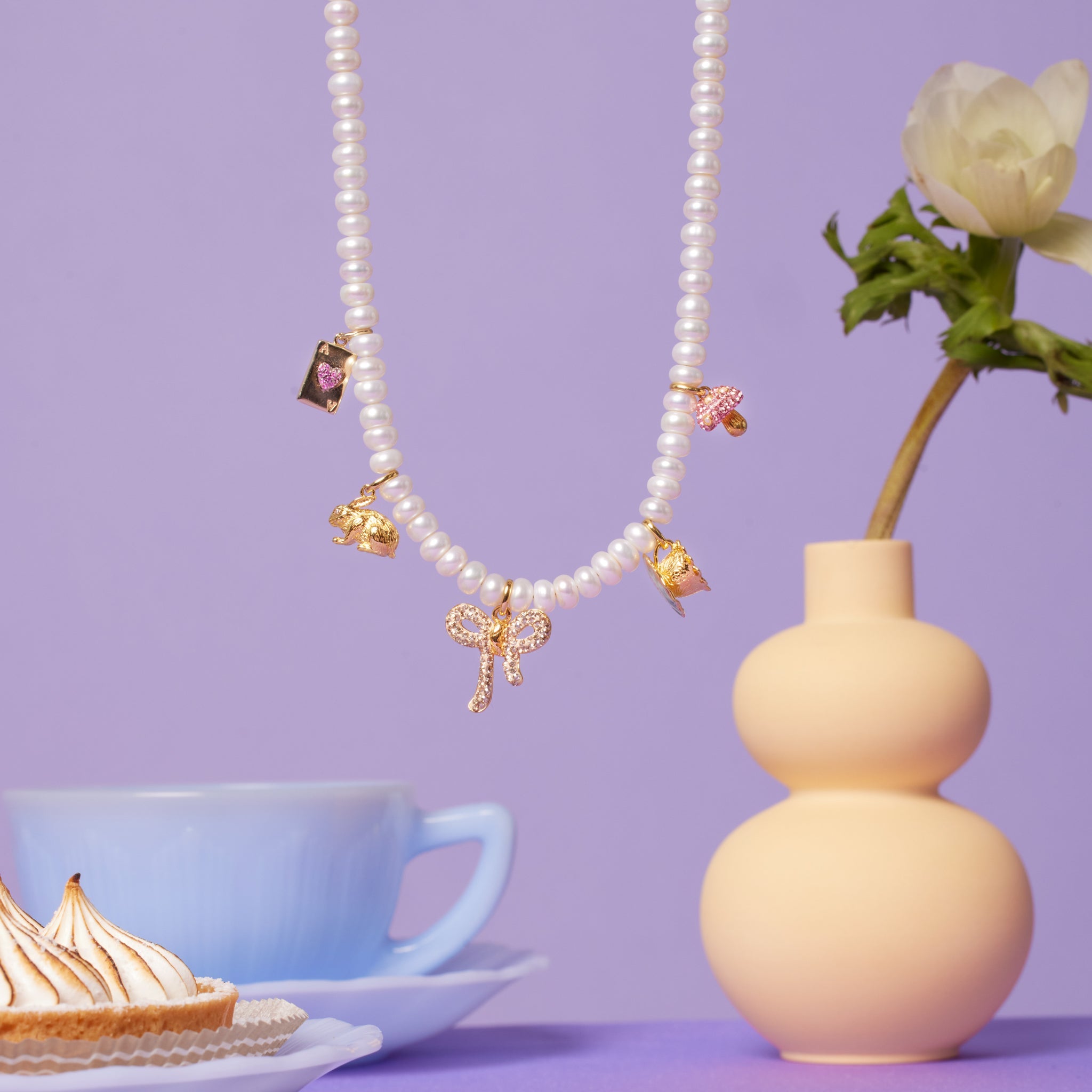 Alice-Inspired Charm Necklace hanging
