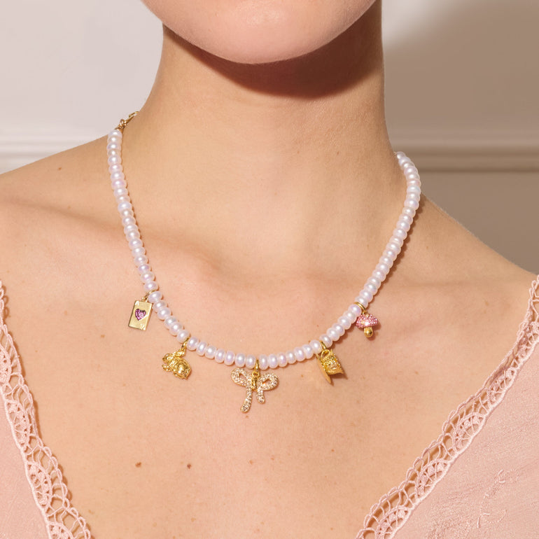 Alice-Inspired Charm Necklace on model