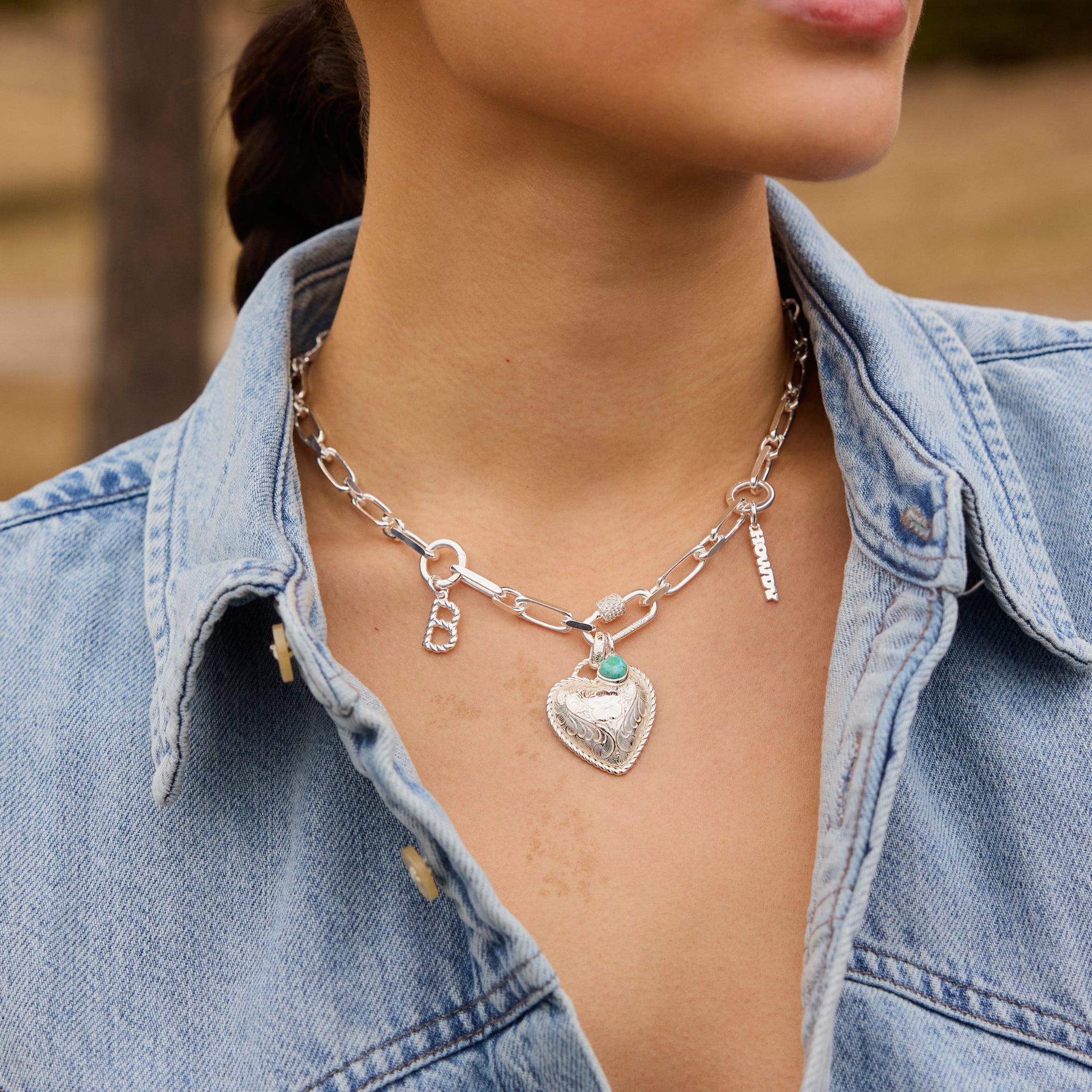 Etched Floral Heart Charm on model