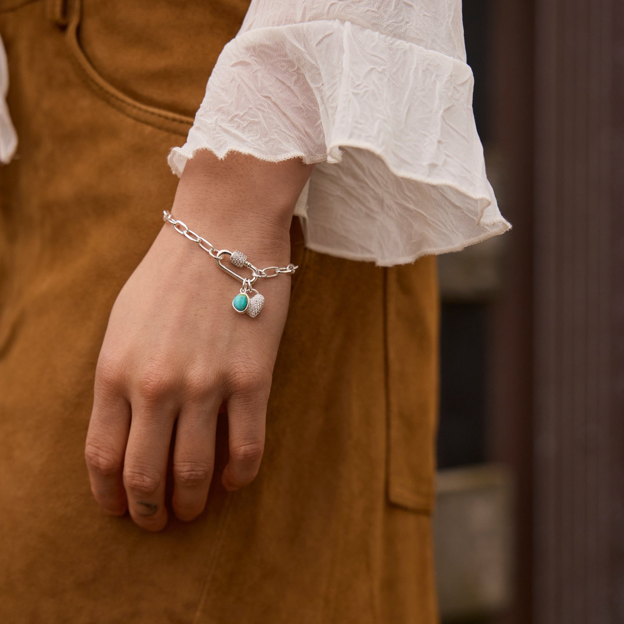 Silver Clip Chain Charm Bracelet Base and Daydream Charm on model