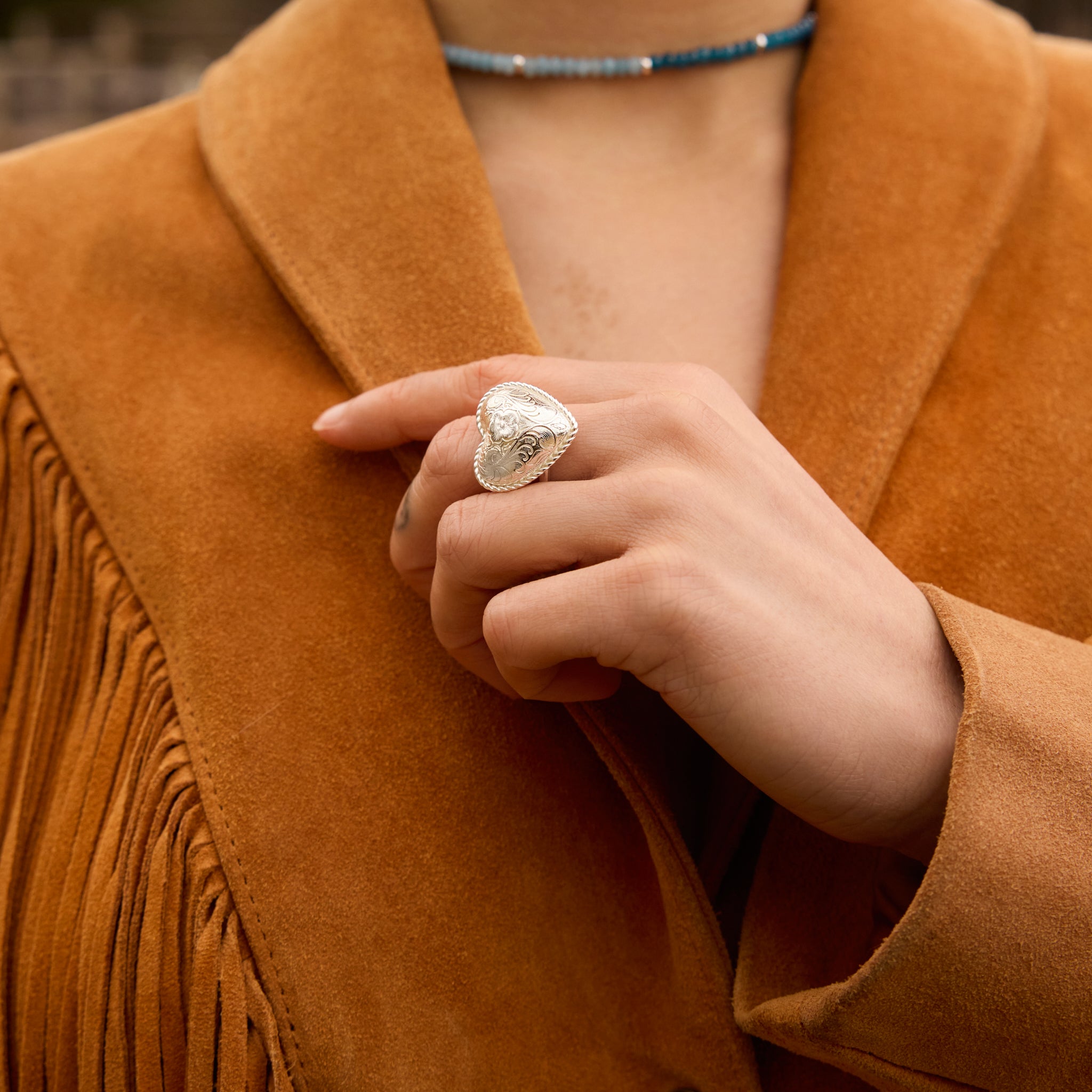 Etched Floral Heart Ring on model