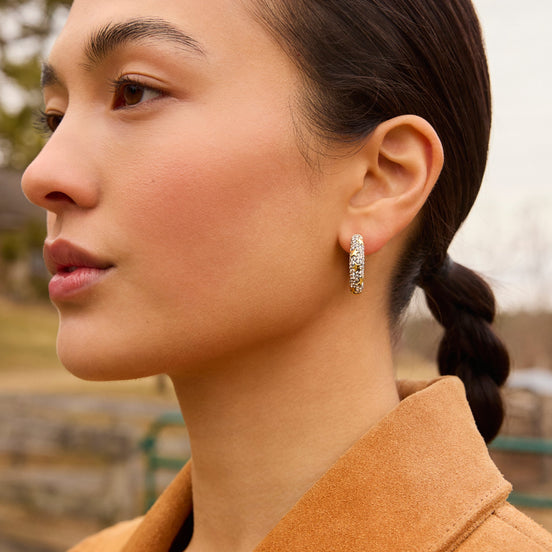 Silver Shade Star Studded Medium Sparkle Hoop Earrings on model