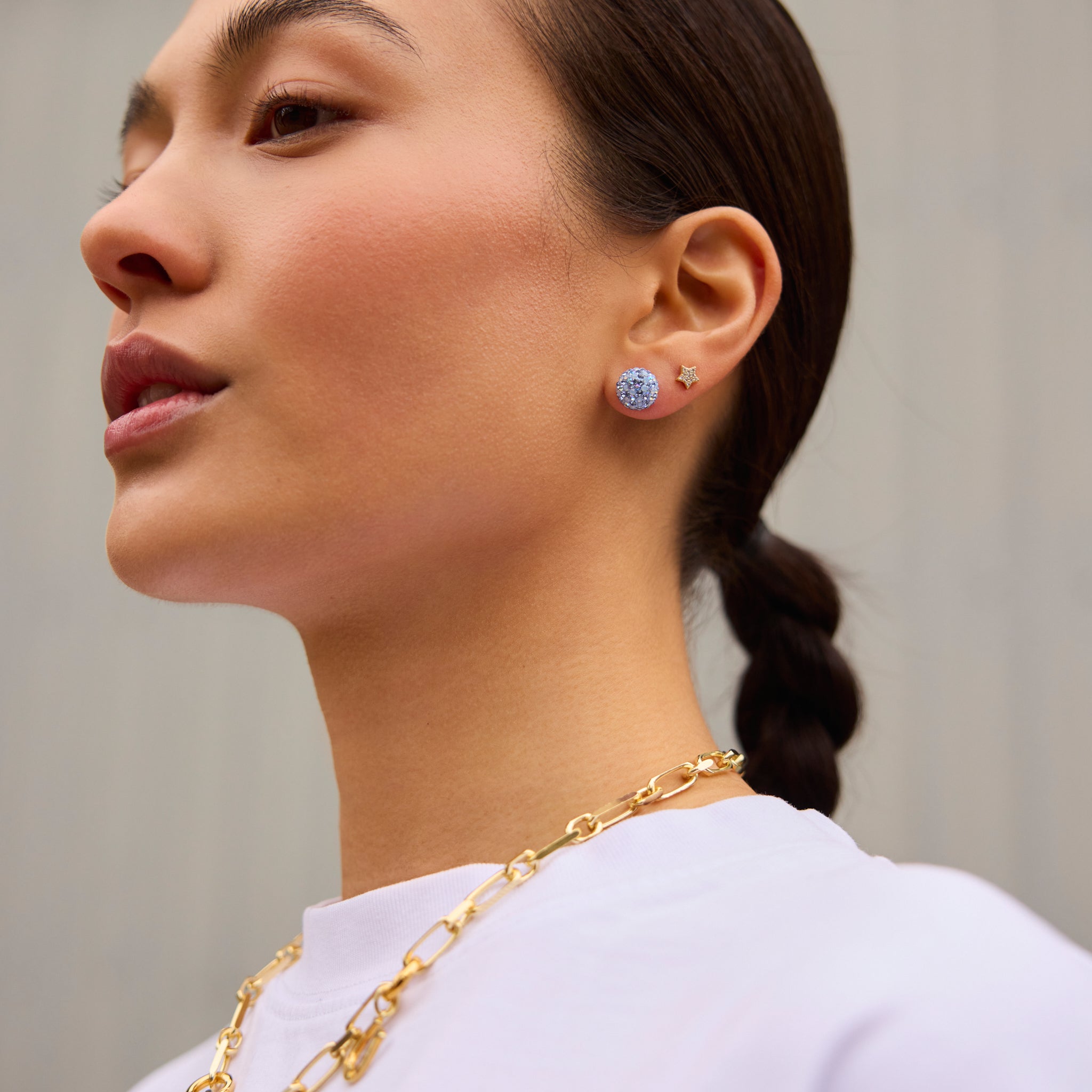 Medium Denim Sparkle Ball™ Stud Earrings on model