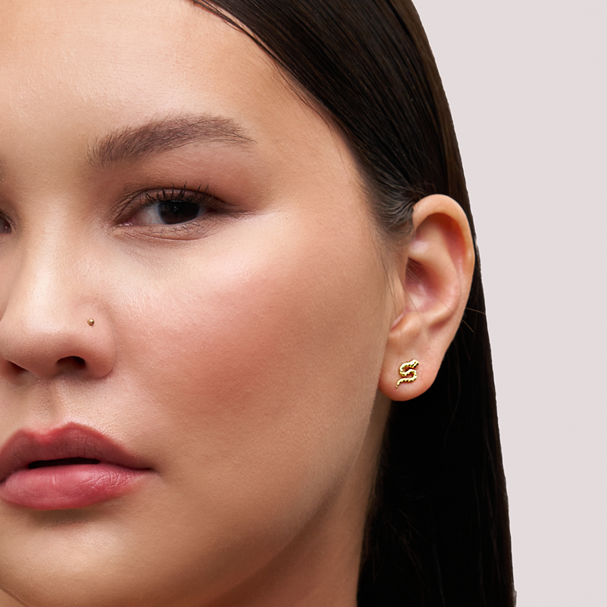 Serpent Stud Earrings Gold on model