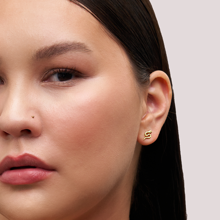 Serpent Stud Earrings Gold on model