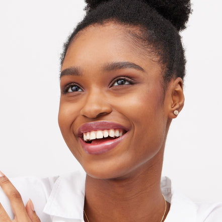 6mm Sparkle Ball™ Stud Earrings Gold on model