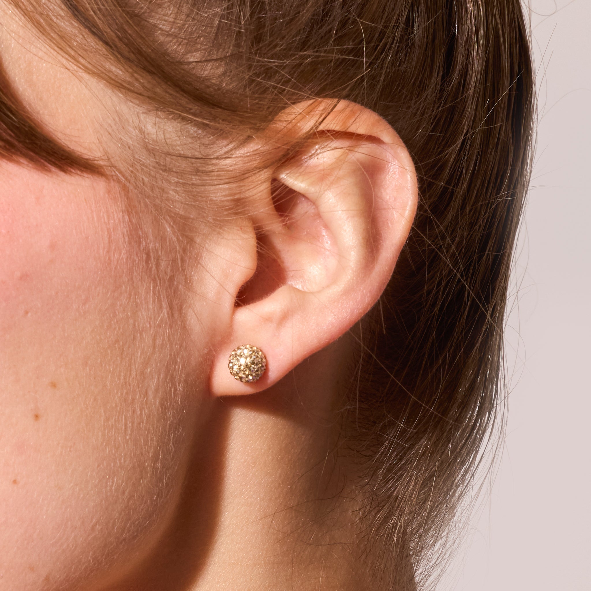 November November Small Birthstone Sparkle Ball™ Stud Earrings on model