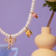 Alice-Inspired Charm Necklace close up