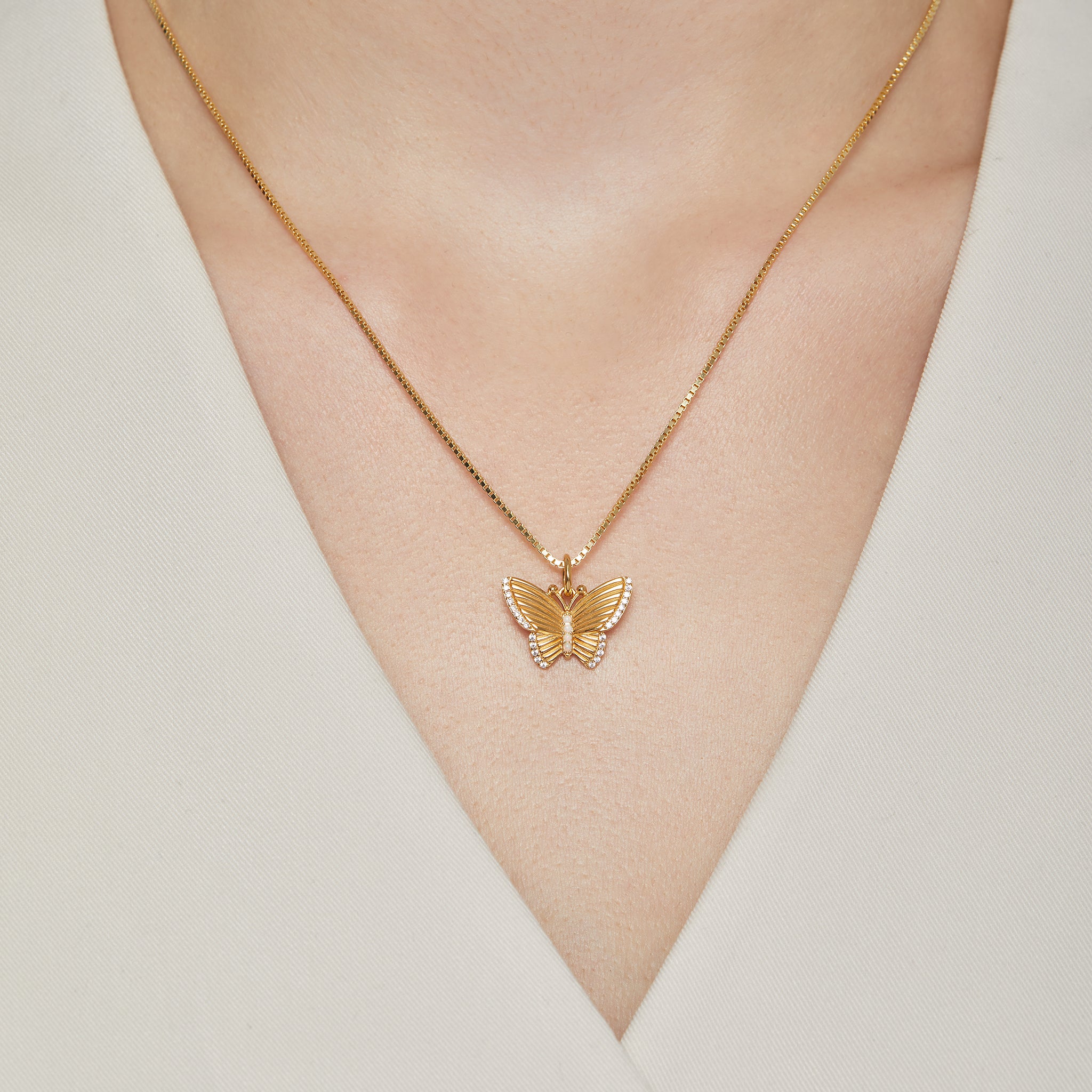 Butterfly Opal Charm on model