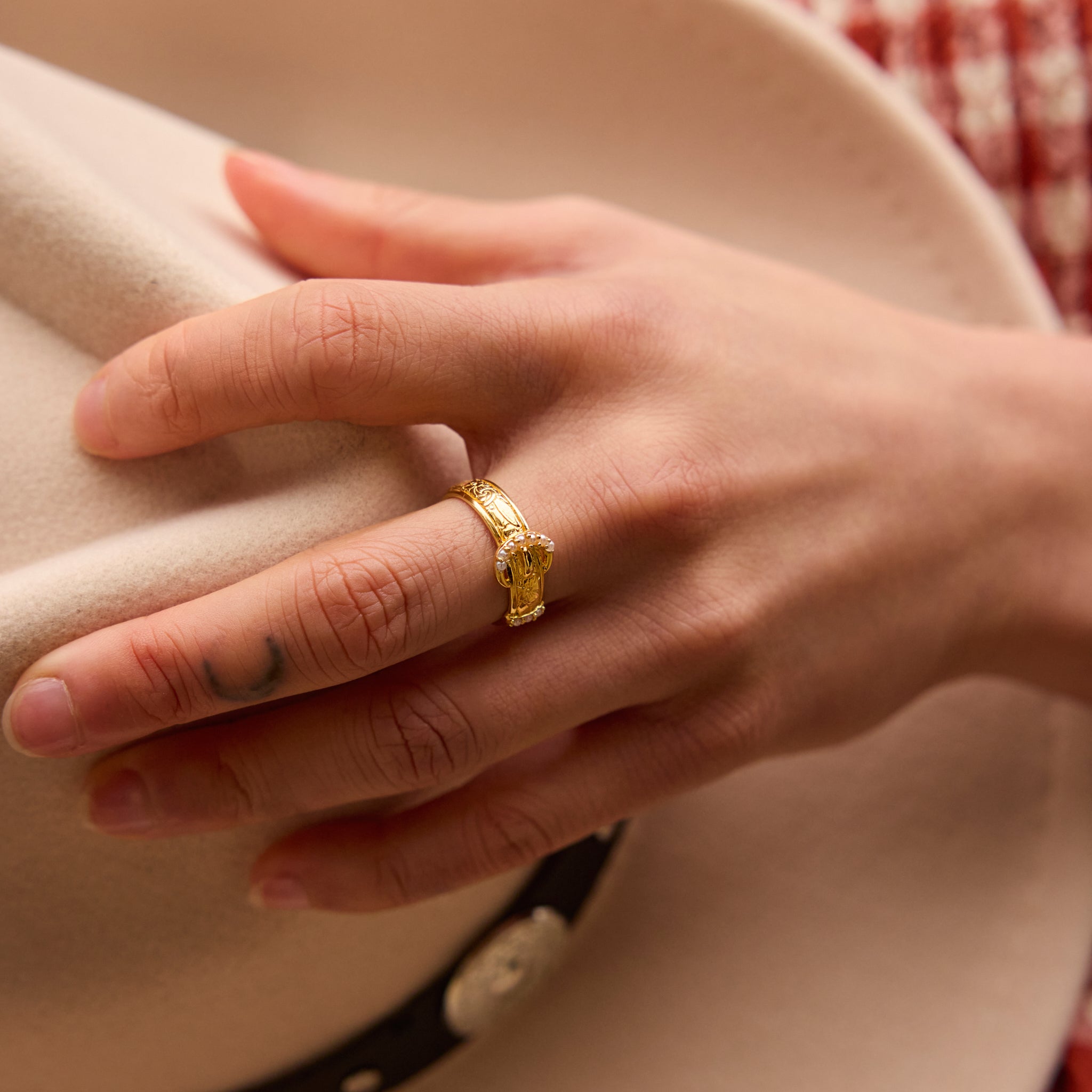 Etched Floral Buckle Ring on model
