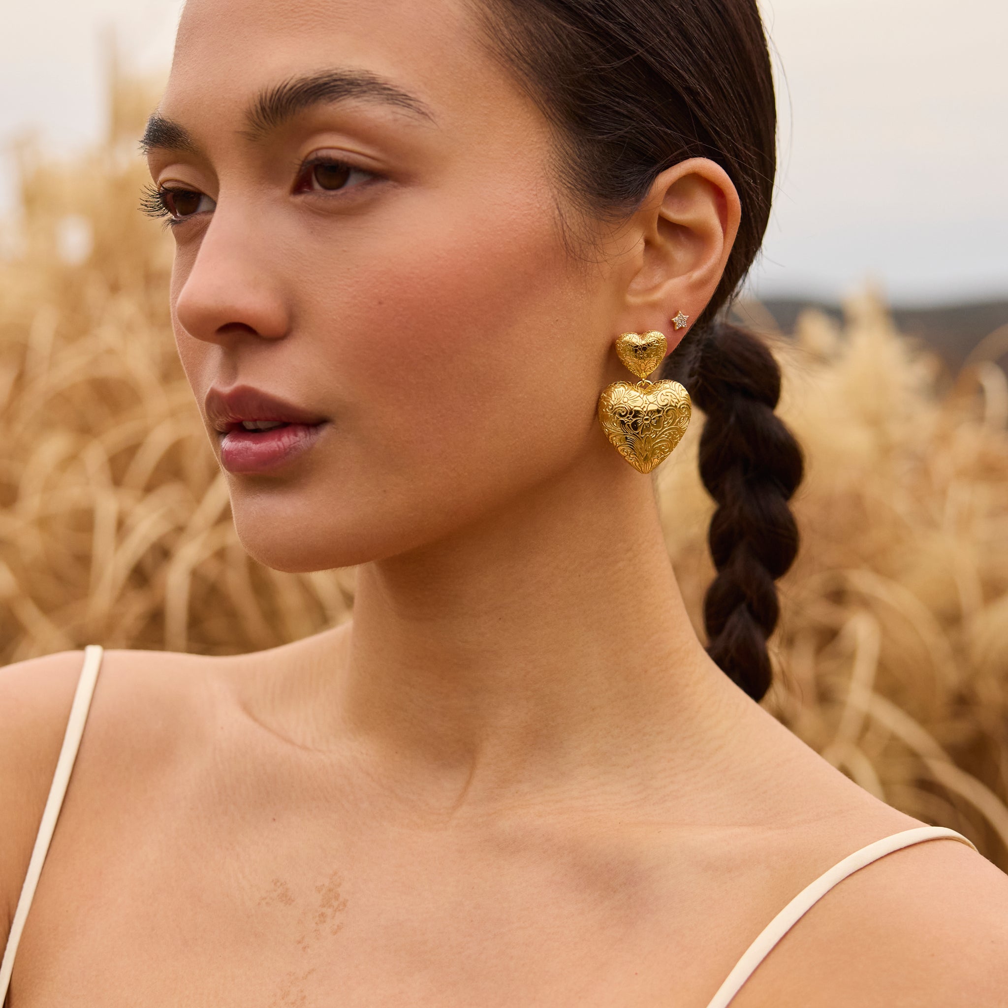 Etched Floral Statement Earrings on model