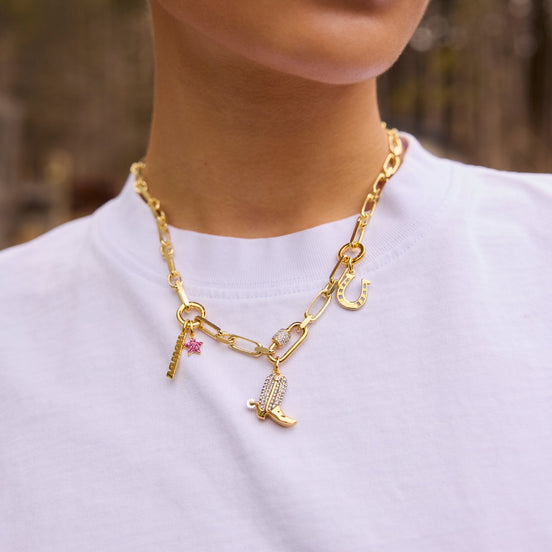 Braided Letter Charm and Ride Boot Charm on model