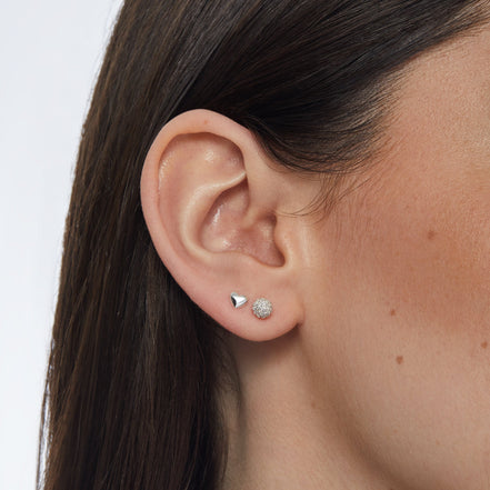 Silver Mini Metal Heart Stud Earrings and Silver Mini Pavé Ball Stud Earrings on model