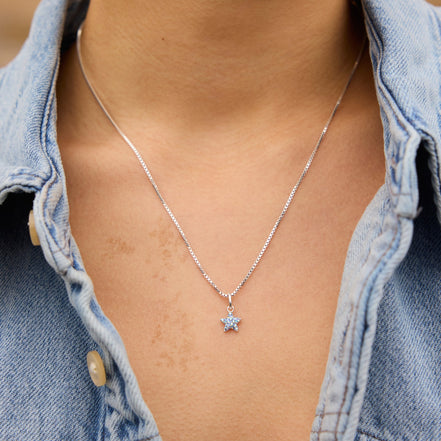 Denim Sparkle Star Charm on model paired with silver Box Chain