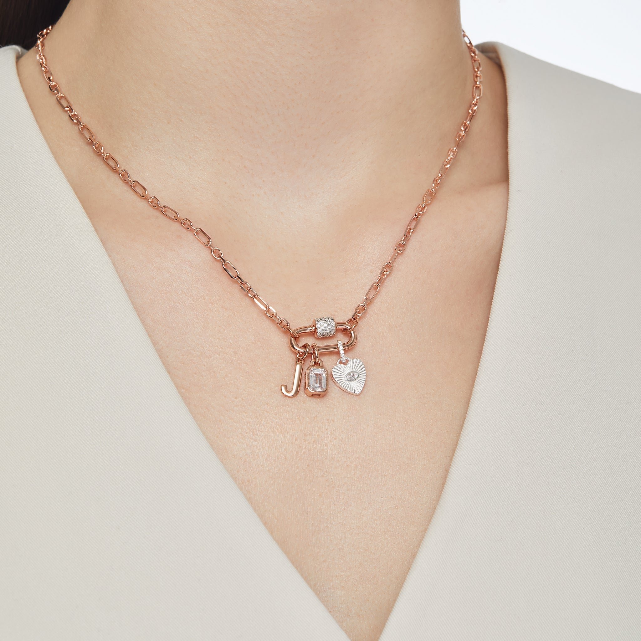 Rose Gold Carabiner Twist Link Charm Holder and Silver Heart Beam Charm on model