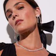 Tennis Bow Statement Earrings on model